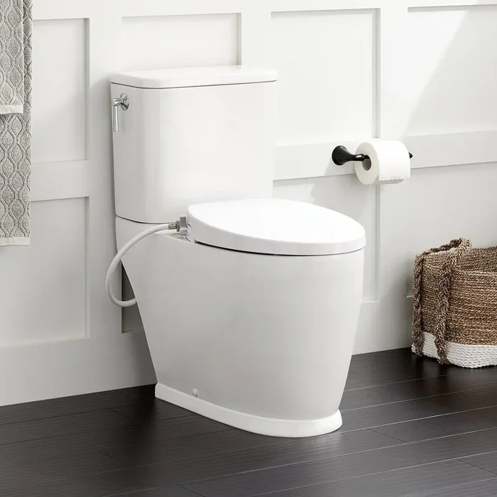 1.28 gpf Elongated Two Piece Skirted Toilet in White