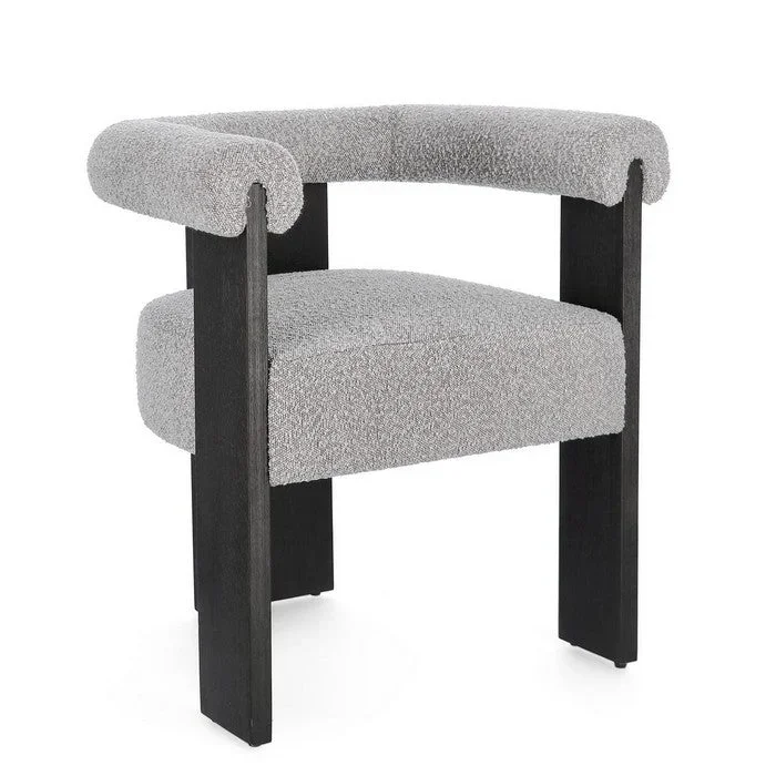 Poltrona in legno con seduta e braccioli boucle – Agape